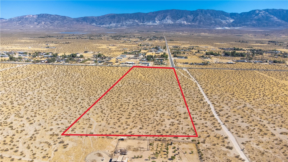 247 Old Woman Springs Road Lucerne Valley, CA 92356 - Photo 4 of 14 South facing View Looking toward Visalia Ave. with San Bernardino Mountain Range in the background . Lot lines are approximate buyer to verify.