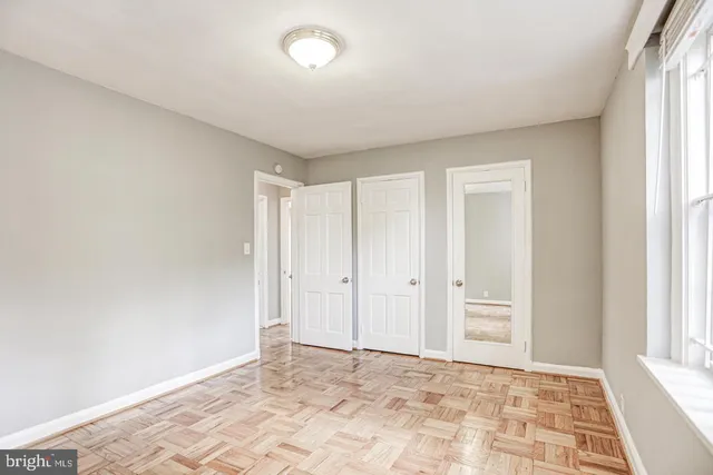 a view of an empty room and window