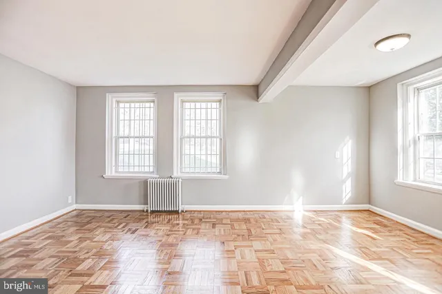 a view of an empty room and window