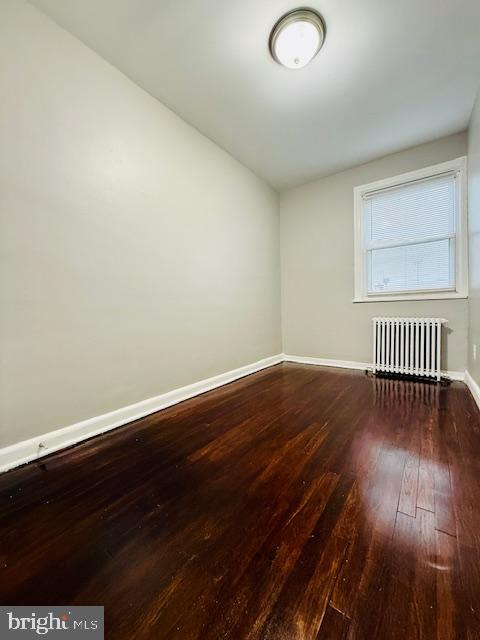 4809 Wilern Avenue Baltimore, MD 21215 - Photo 14 of 18 a view of a room with wooden floor and wooden floor
