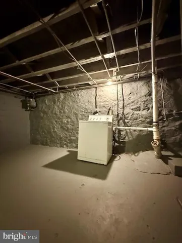 a view of room with refrigerator