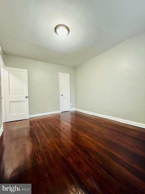 4809 Wilern Avenue Baltimore, MD 21215 - Photo 10 of 18 an empty room with wooden floor