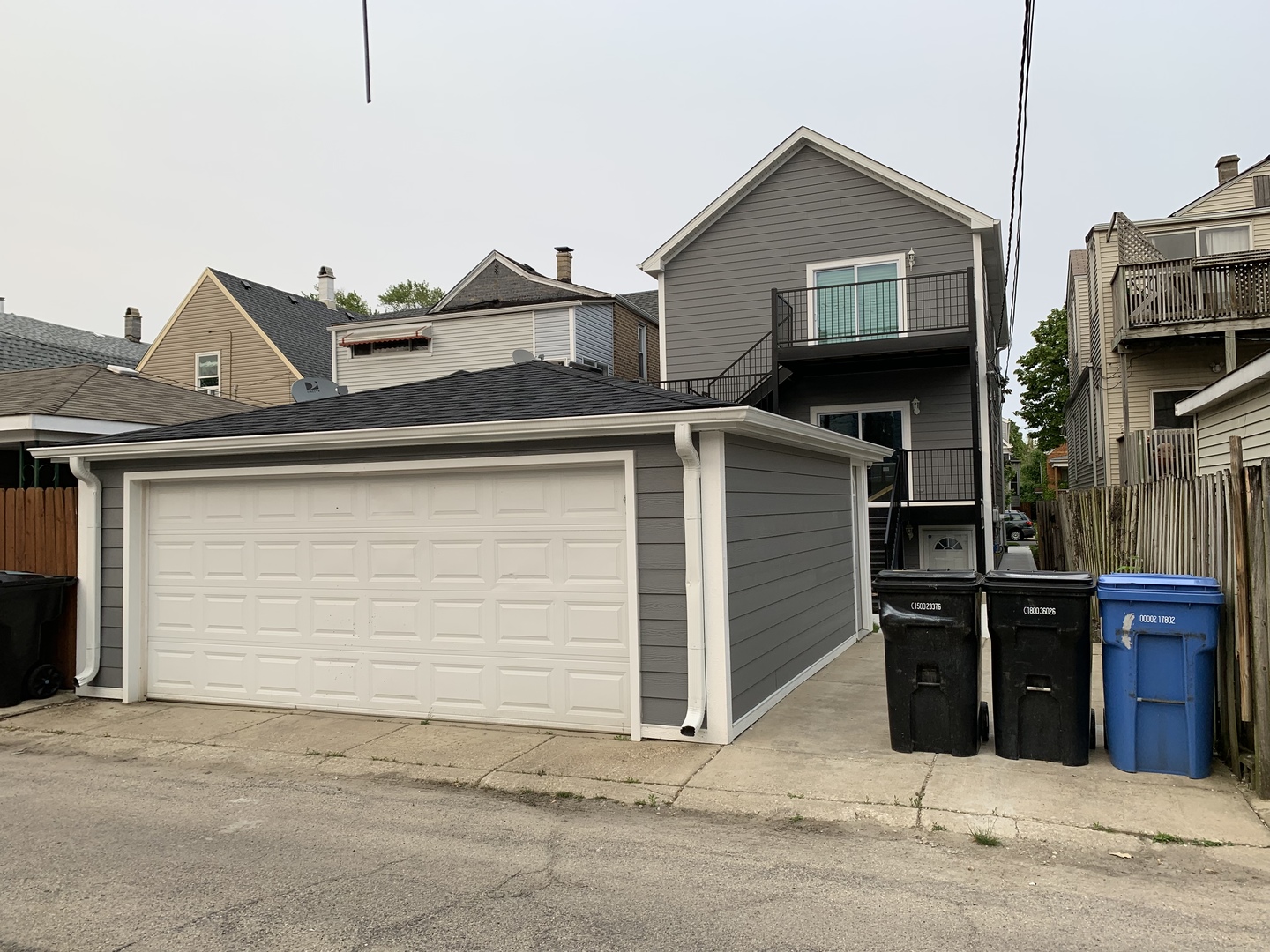 3706 North Drake Avenue, Unit G Chicago, IL 60618 - Photo 20 of 23 a front view of a house with barbeque grill