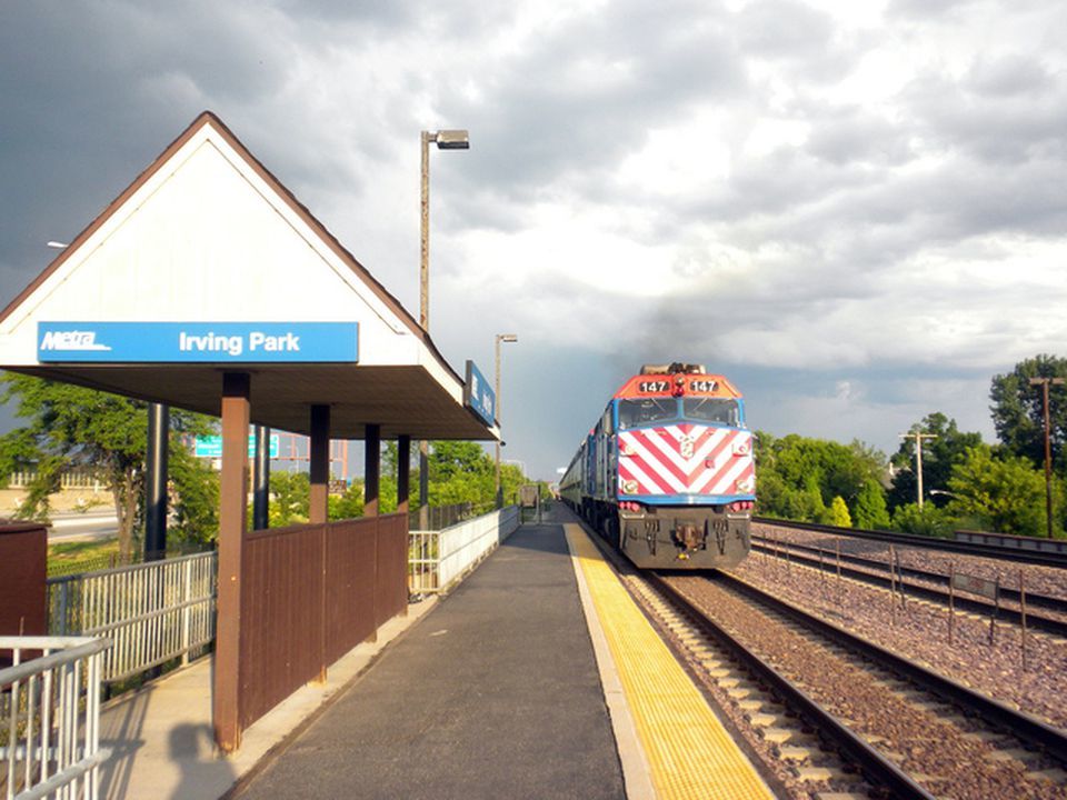 3706 North Drake Avenue, Unit G Chicago, IL 60618 - Photo 2 of 23 a view of a train station