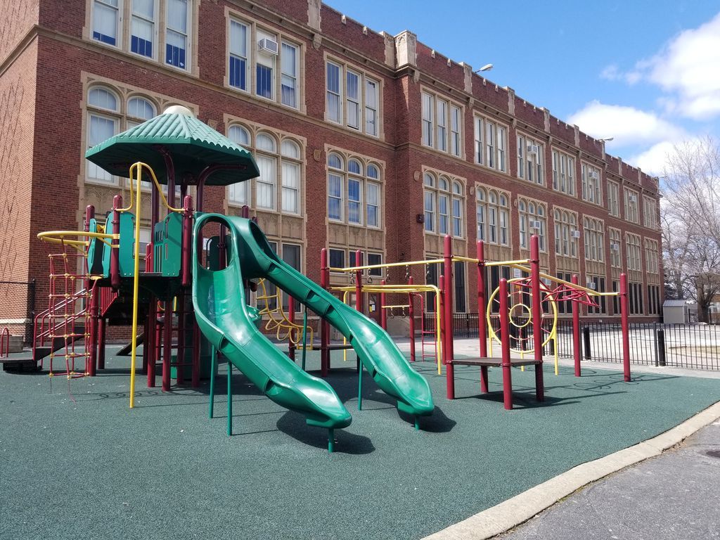 3706 North Drake Avenue, Unit G Chicago, IL 60618 - Photo 23 of 23 a childrens park with lots of swings and slides