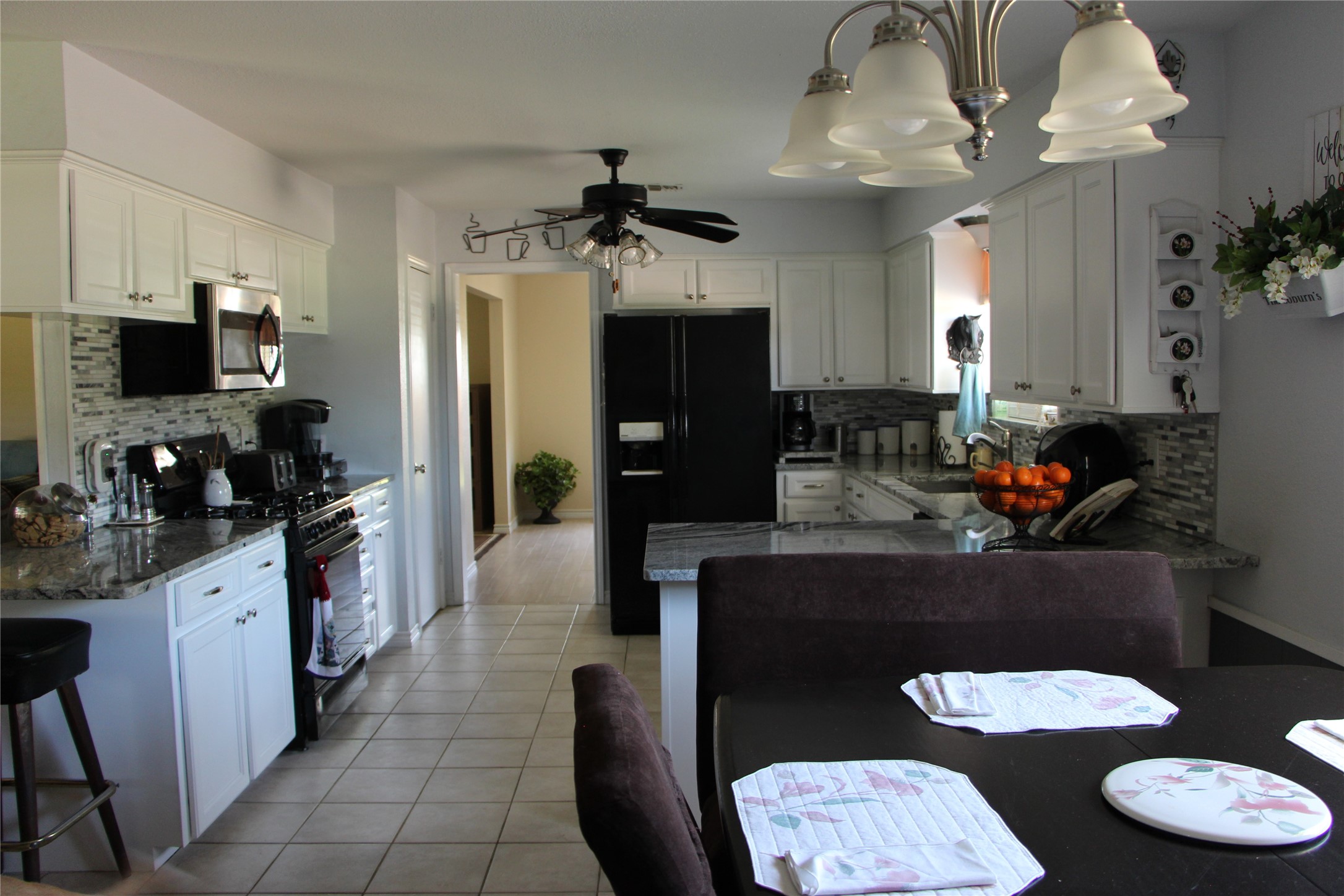 12710 Dannhaus Road Needville, TX 77461 - Photo 11 of 24 Breakfast area, Kitchen, Leads to formal dinning area