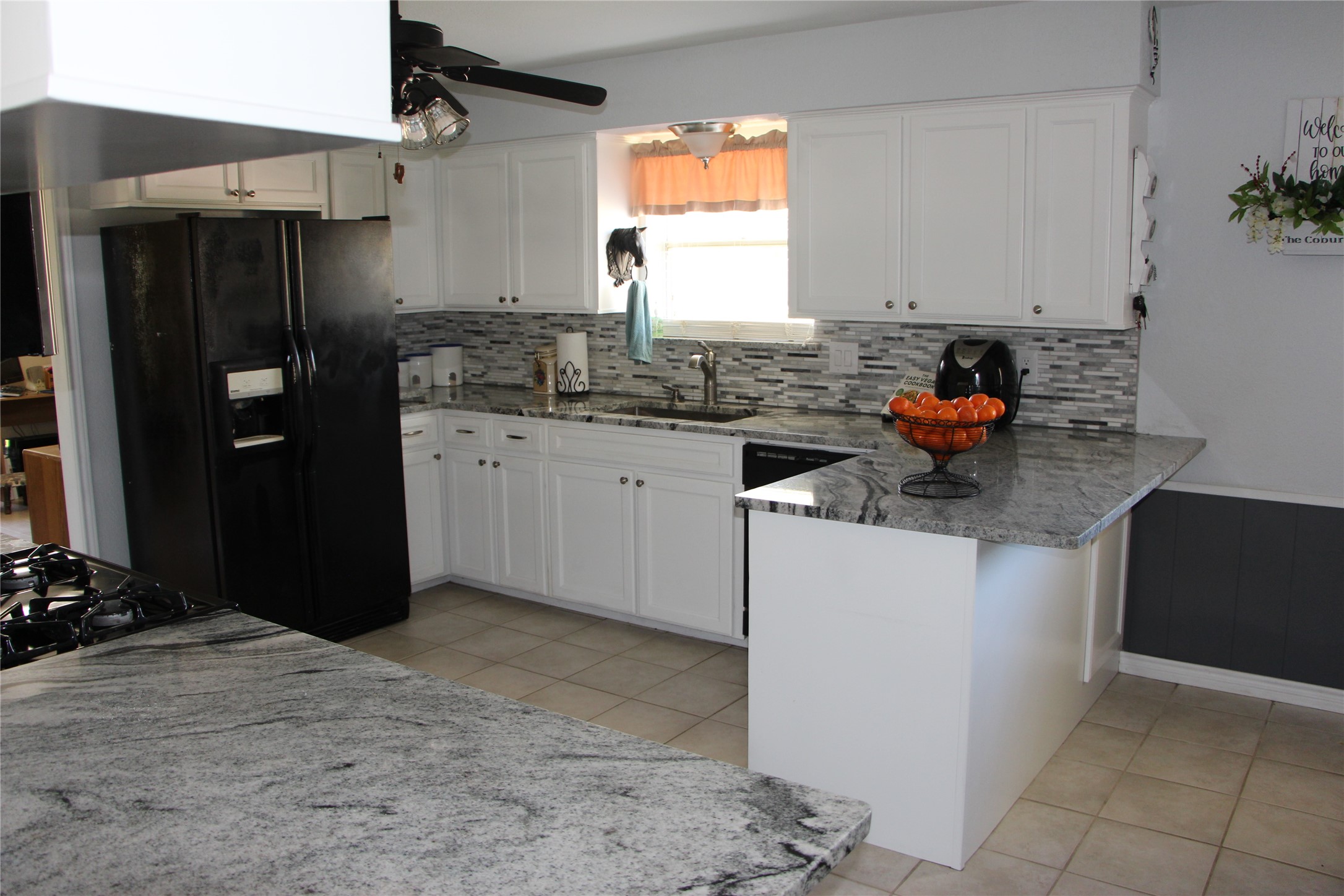 12710 Dannhaus Road Needville, TX 77461 - Photo 12 of 24 Black and white granite counter tops. Glass back splash,
h
