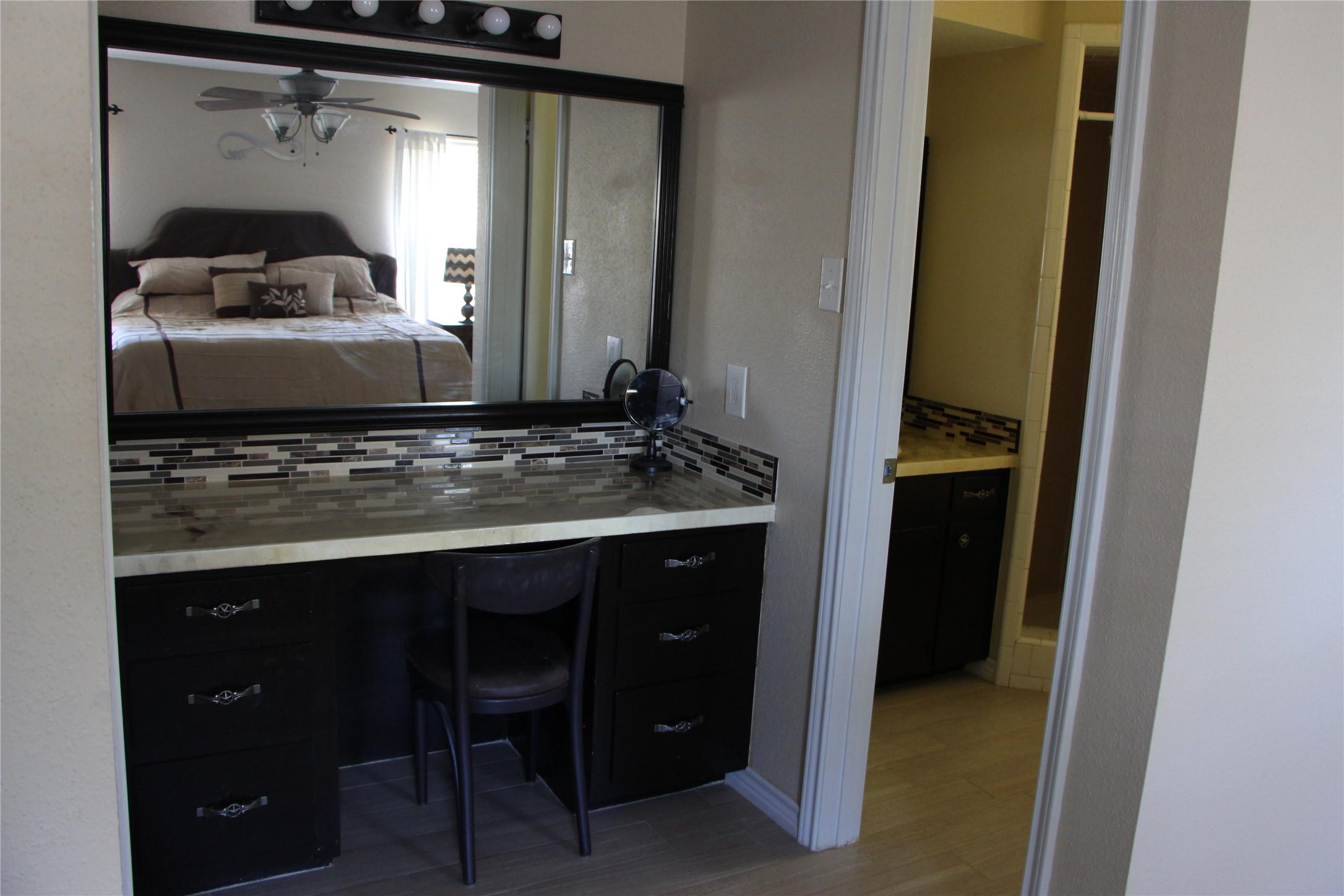 12710 Dannhaus Road Needville, TX 77461 - Photo 22 of 24 Dressing area and bath in Master bedroom
