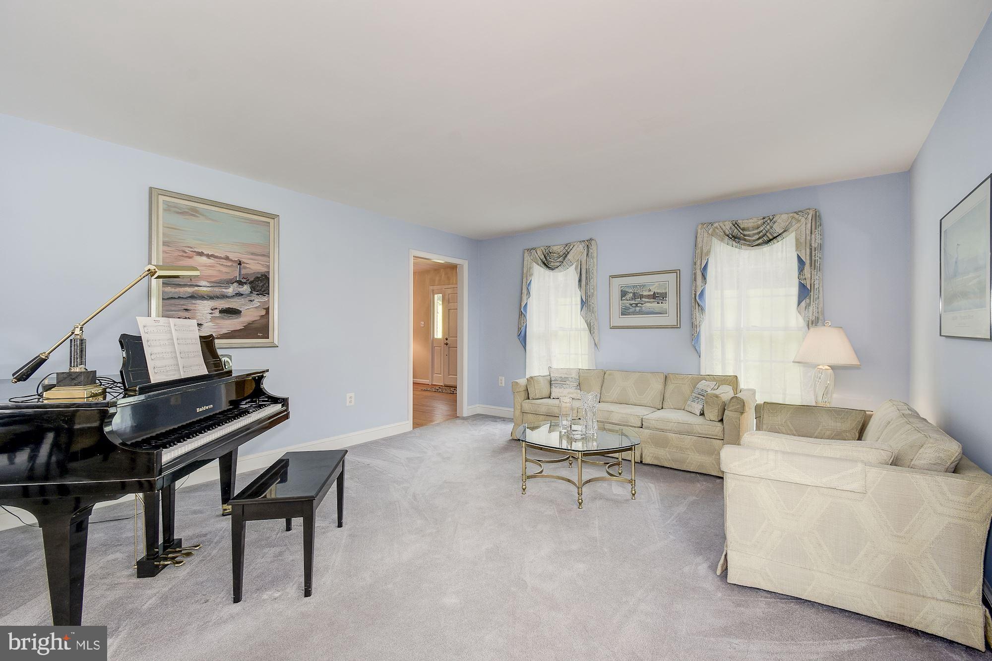 10920 Ward Road Dunkirk, MD 20754 - Photo 11 of 63 a living room with furniture and a piano