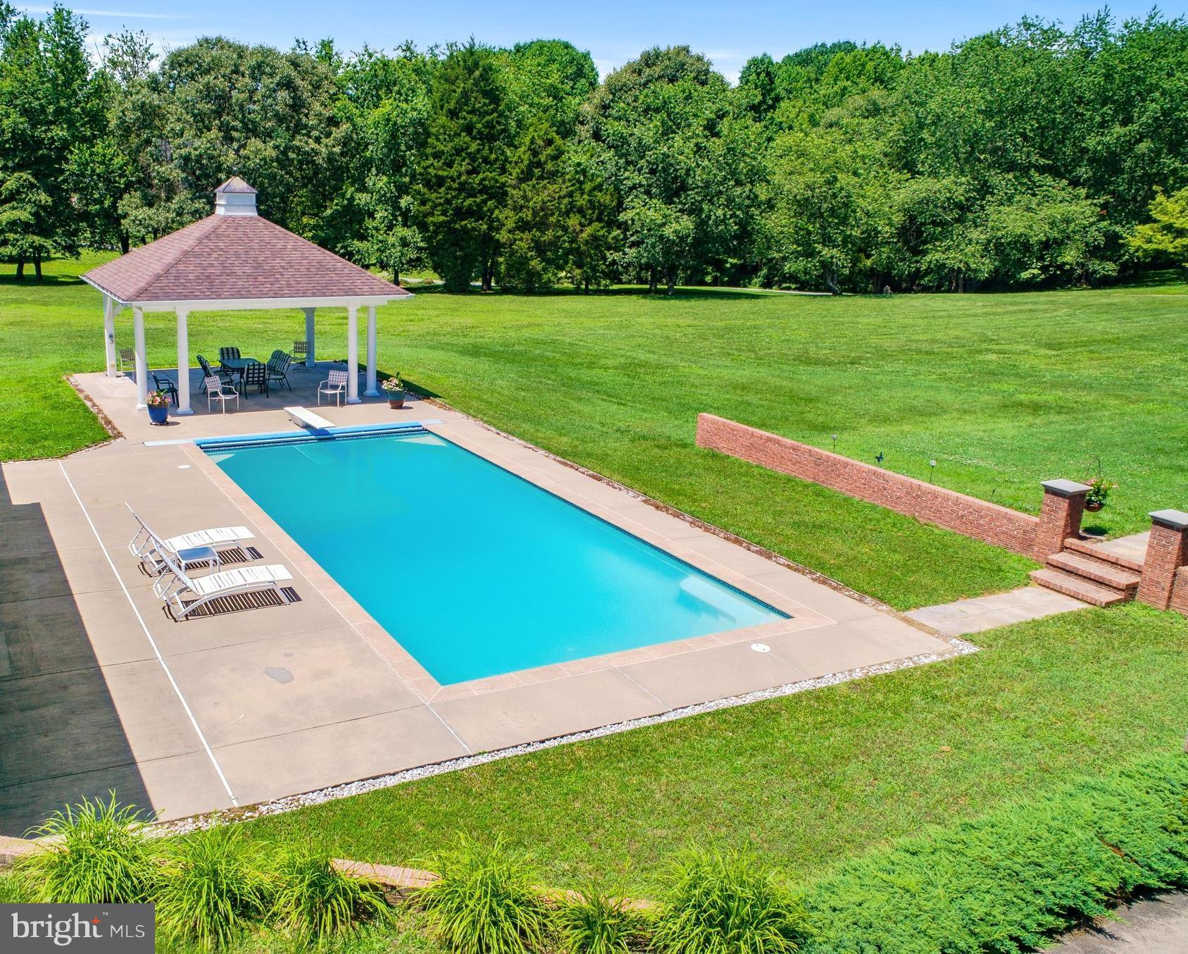 10920 Ward Road Dunkirk, MD 20754 - Photo 3 of 63 a view of outdoor space with seating area and trees