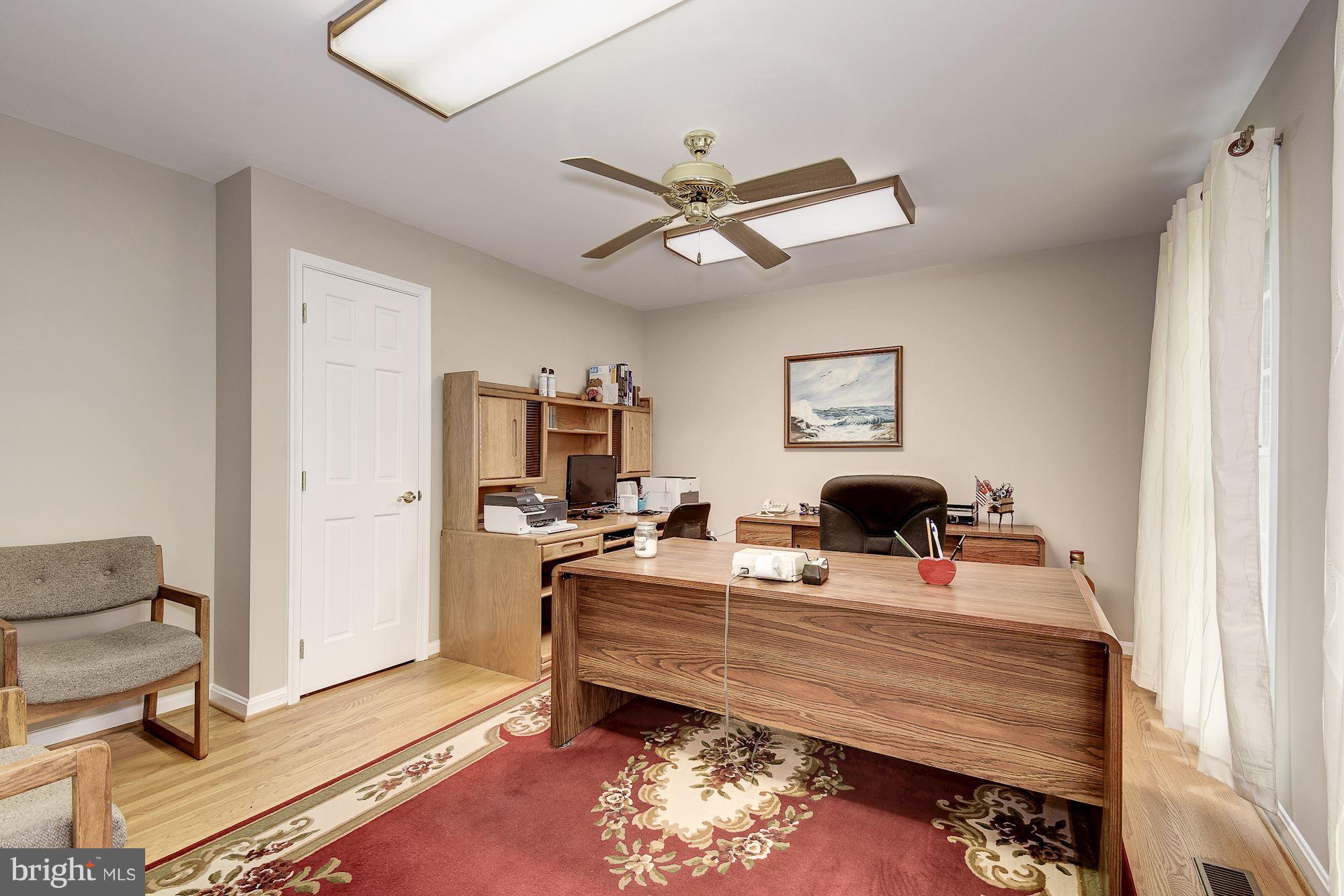 10920 Ward Road Dunkirk, MD 20754 - Photo 23 of 63 a bed room with a bed mirror and a window