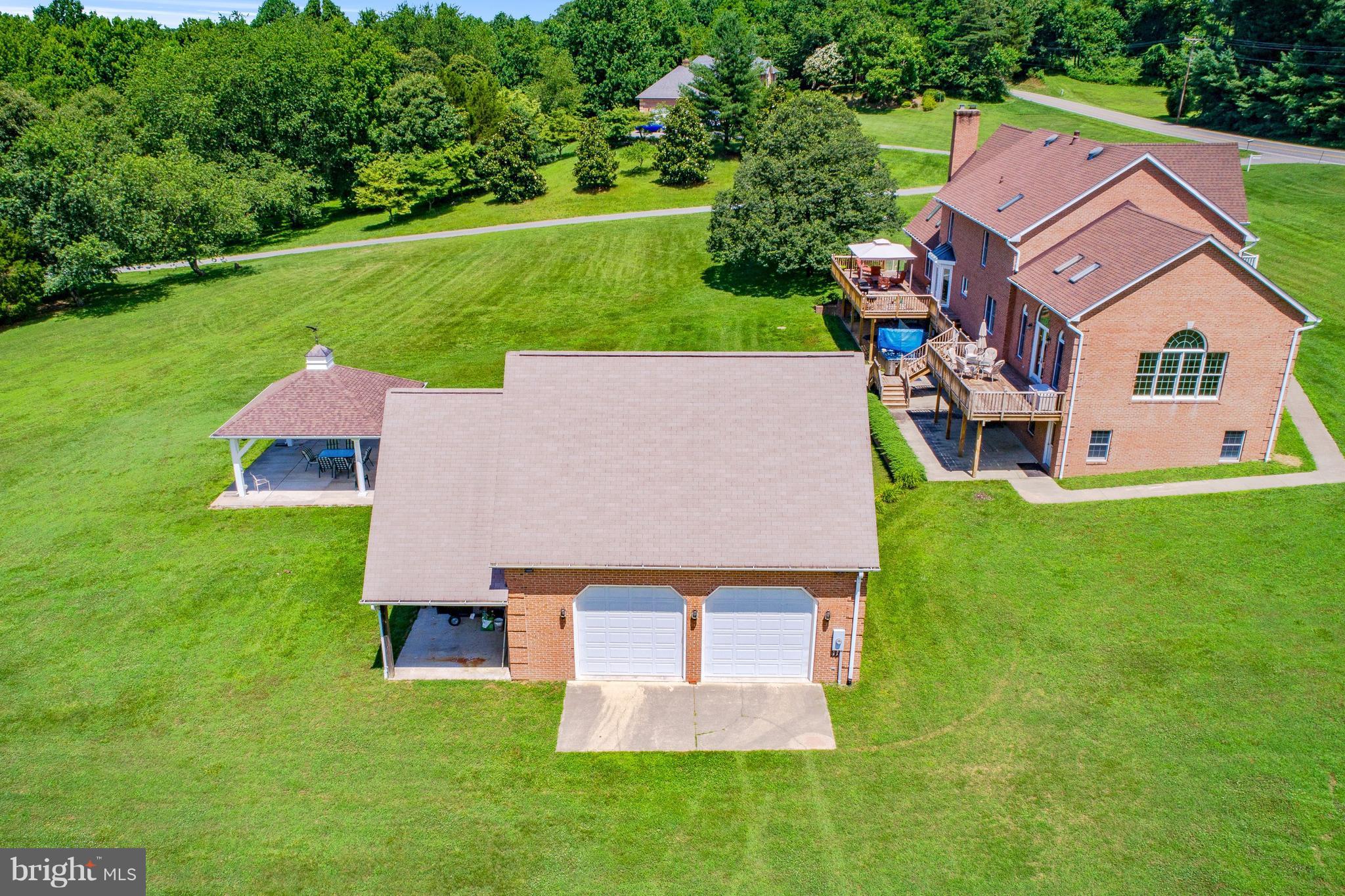 10920 Ward Road Dunkirk, MD 20754 - Photo 5 of 63 an aerial view of a house with swimming pool garden and outdoor seating
