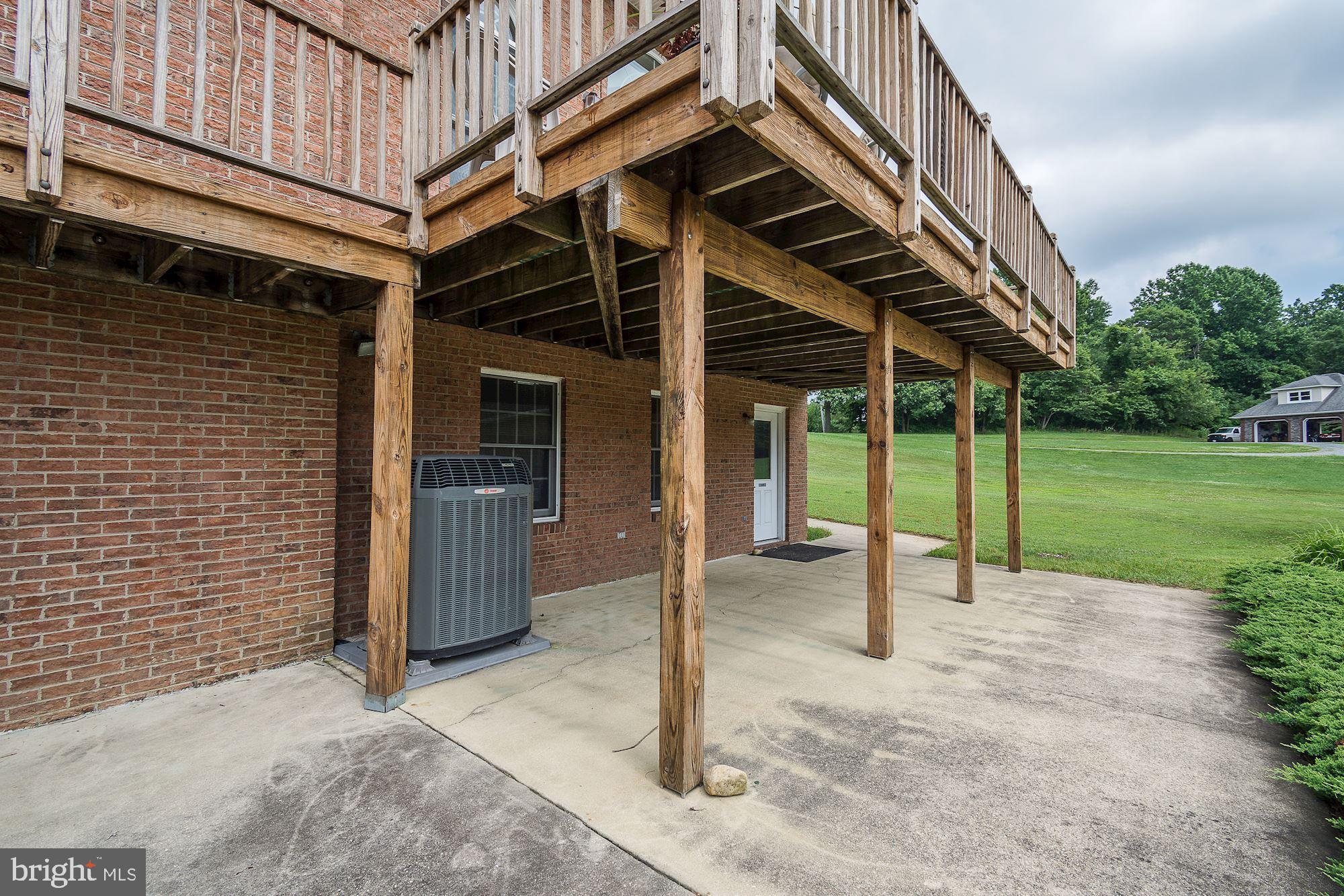 10920 Ward Road Dunkirk, MD 20754 - Photo 49 of 63 a view of a house with backyard and porch