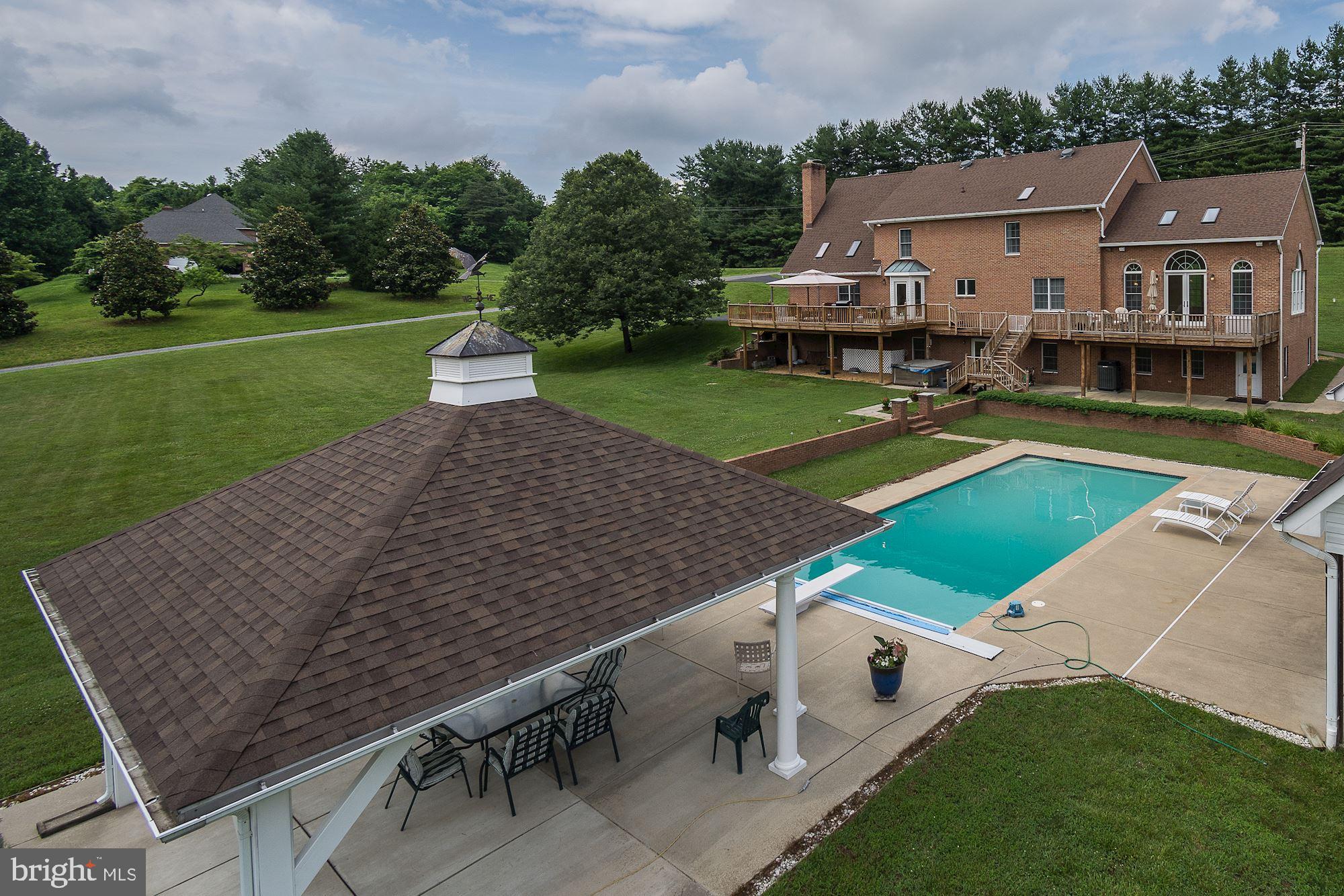 10920 Ward Road Dunkirk, MD 20754 - Photo 50 of 63 an aerial view of a house with a yard and lake view
