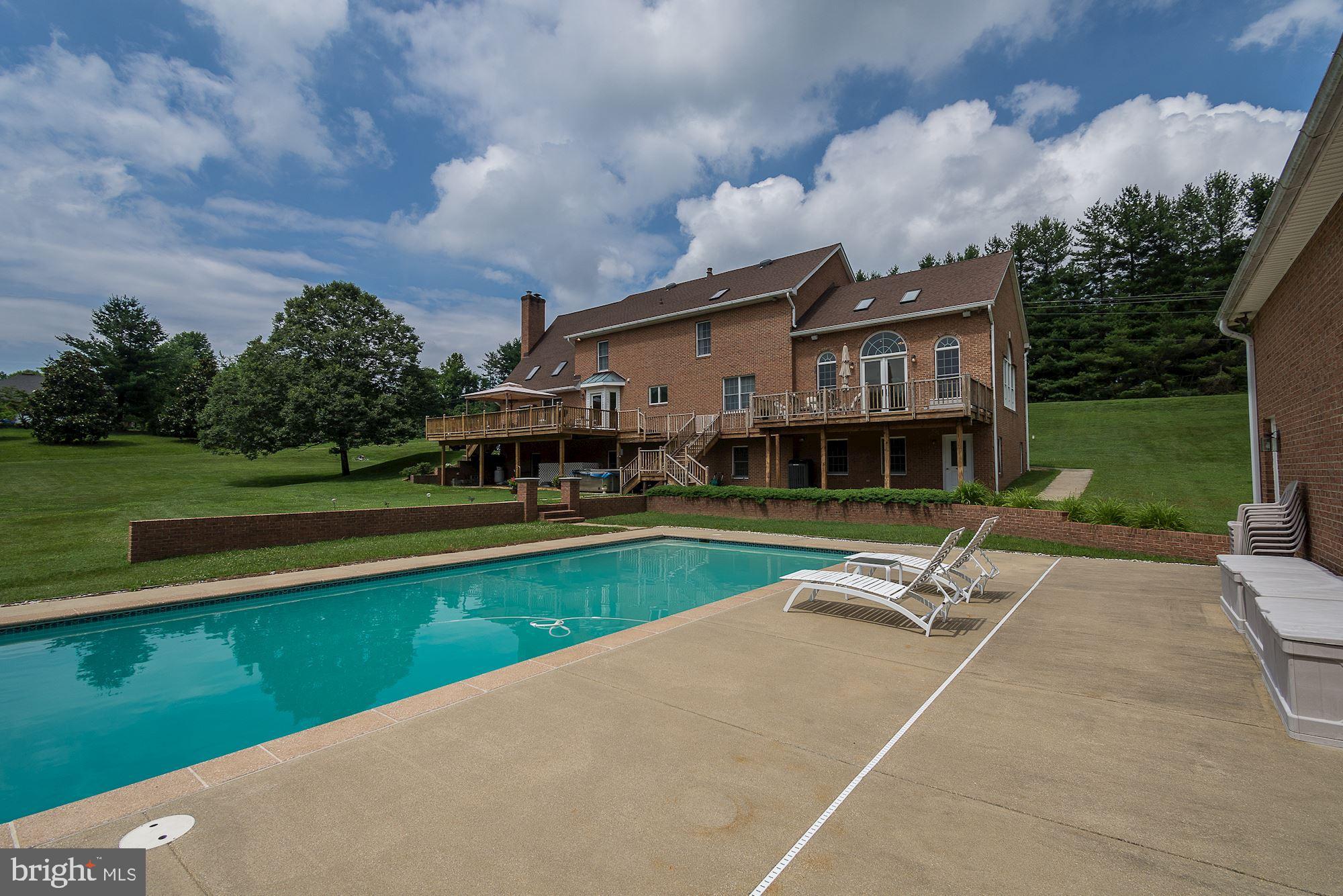 10920 Ward Road Dunkirk, MD 20754 - Photo 53 of 63 a house with garden in front of it