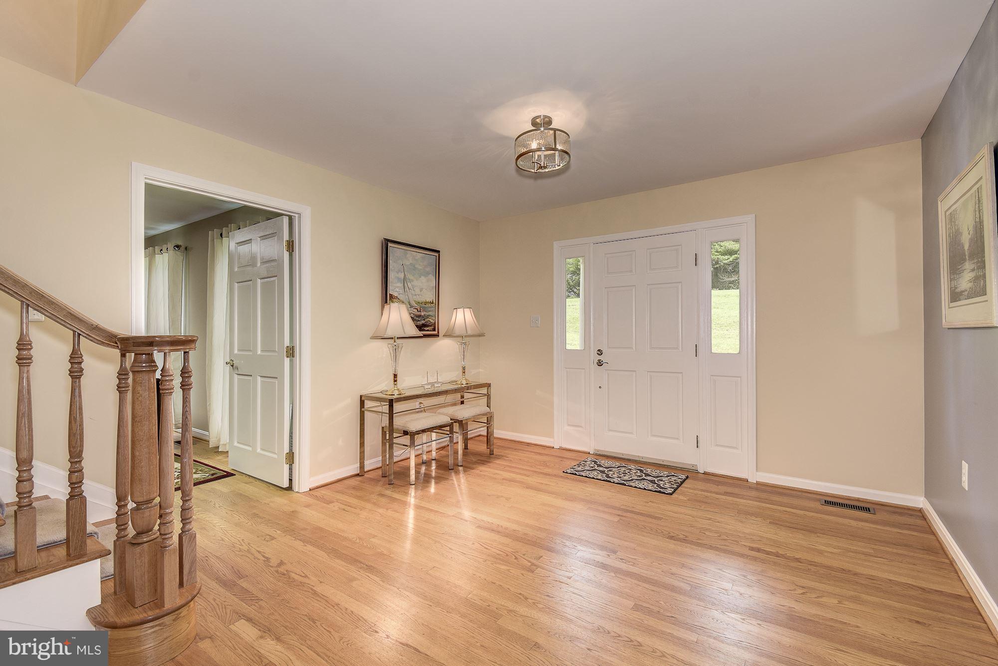 10920 Ward Road Dunkirk, MD 20754 - Photo 8 of 63 a view of empty room with wooden floor