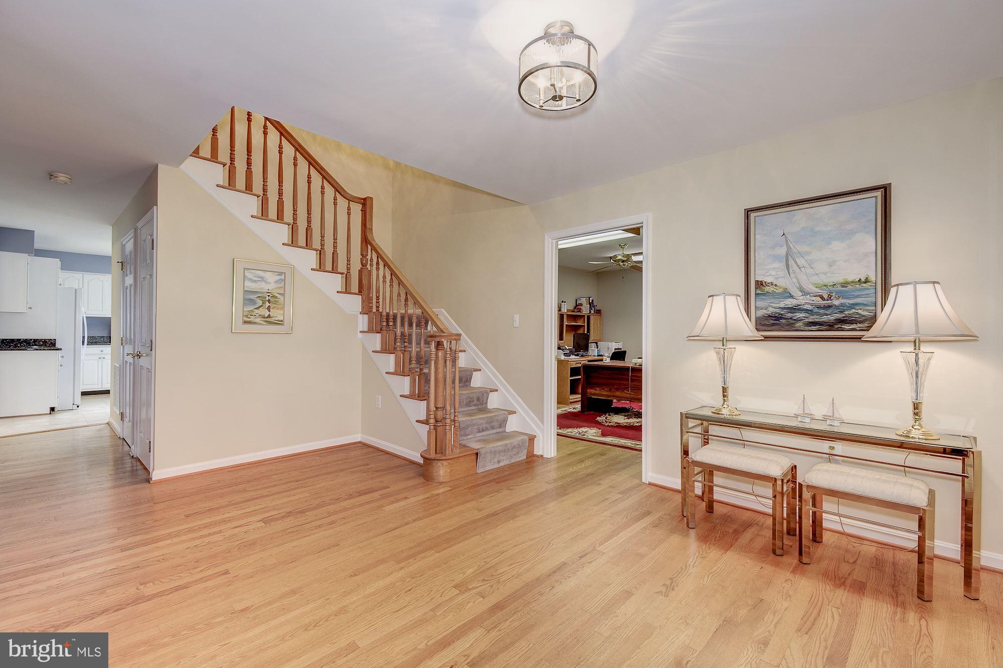 10920 Ward Road Dunkirk, MD 20754 - Photo 9 of 63 a view of a livingroom with furniture and hardwood floor