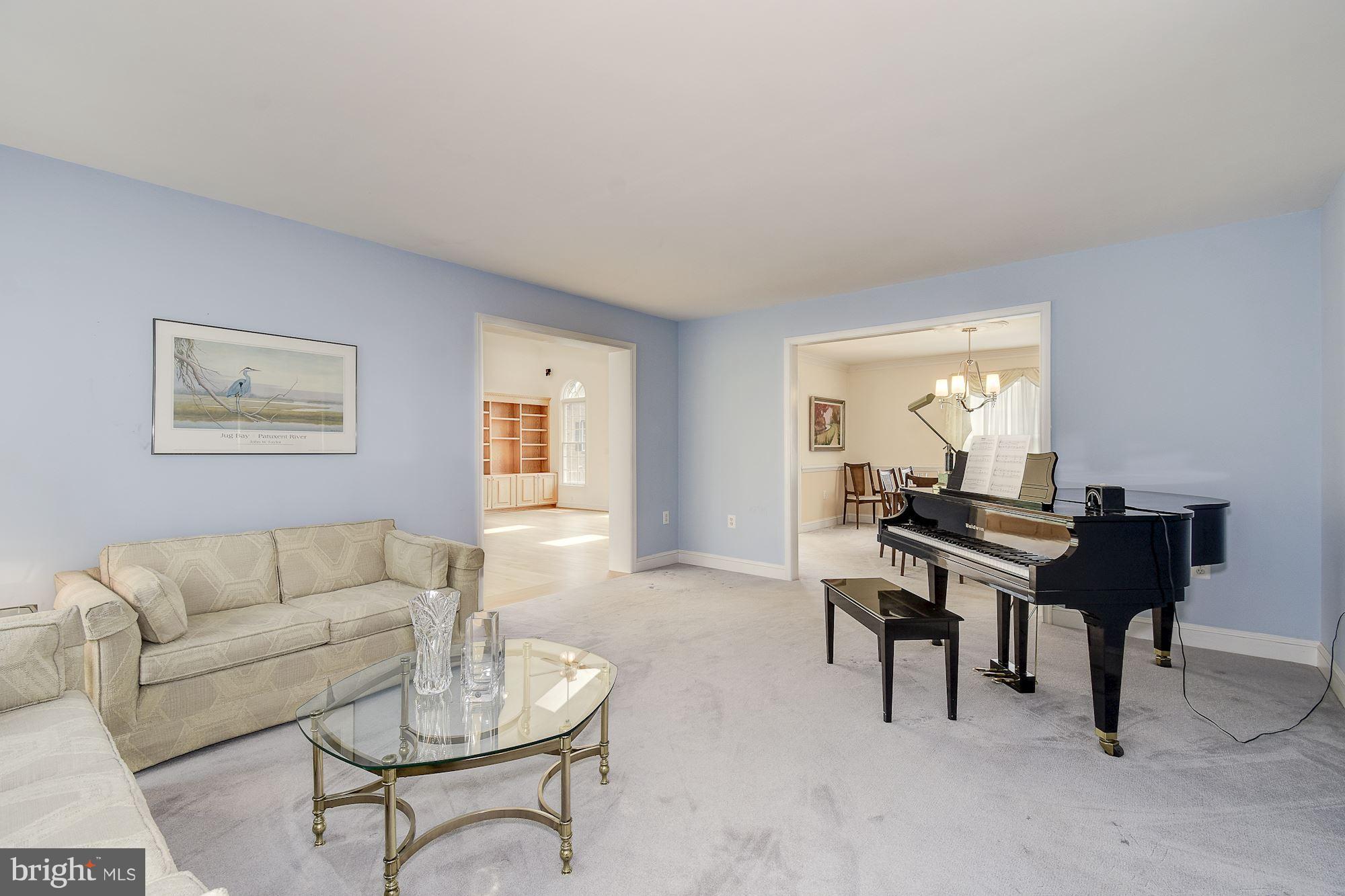 10920 Ward Road Dunkirk, MD 20754 - Photo 10 of 63 a living room with furniture a window and a piano