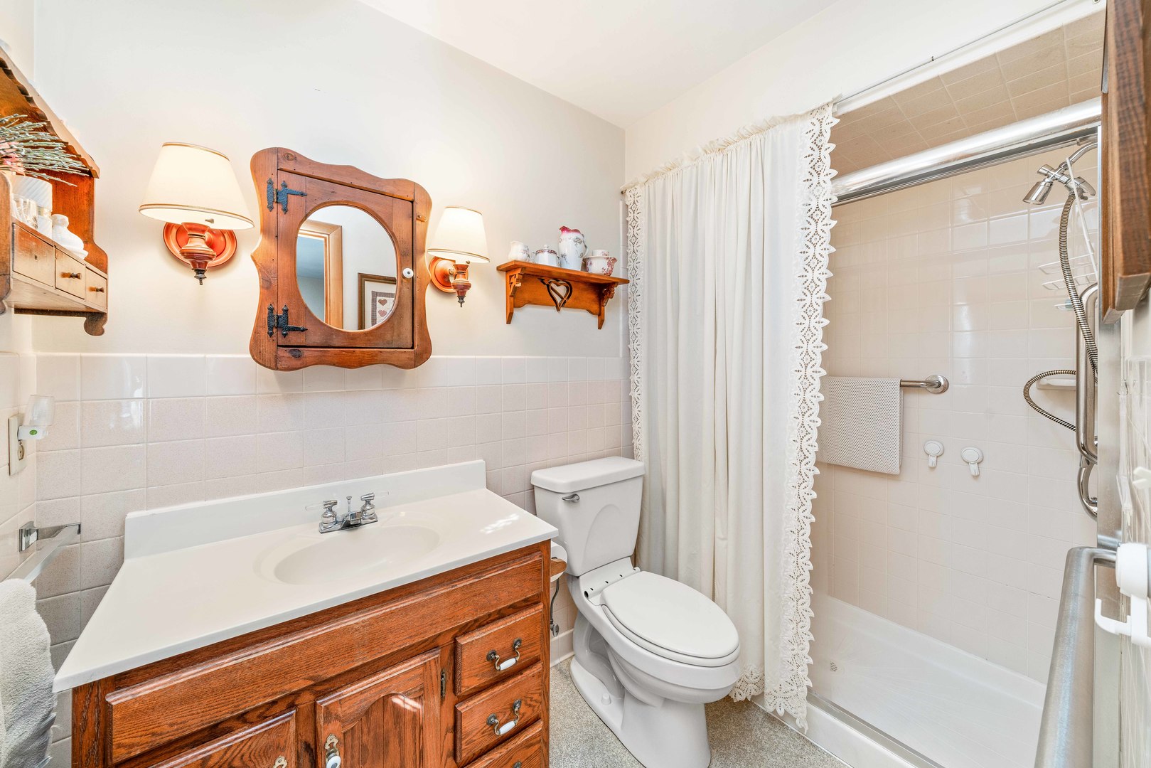 808 Normal Road DeKalb, IL 60115 - Photo 20 of 29 a bathroom with a sink toilet and shower