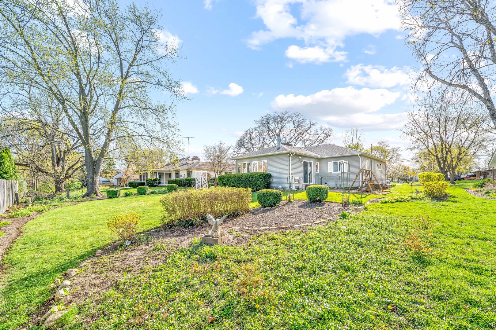 808 Normal Road DeKalb, IL 60115 - Photo 26 of 29 a view of a house with a big yard