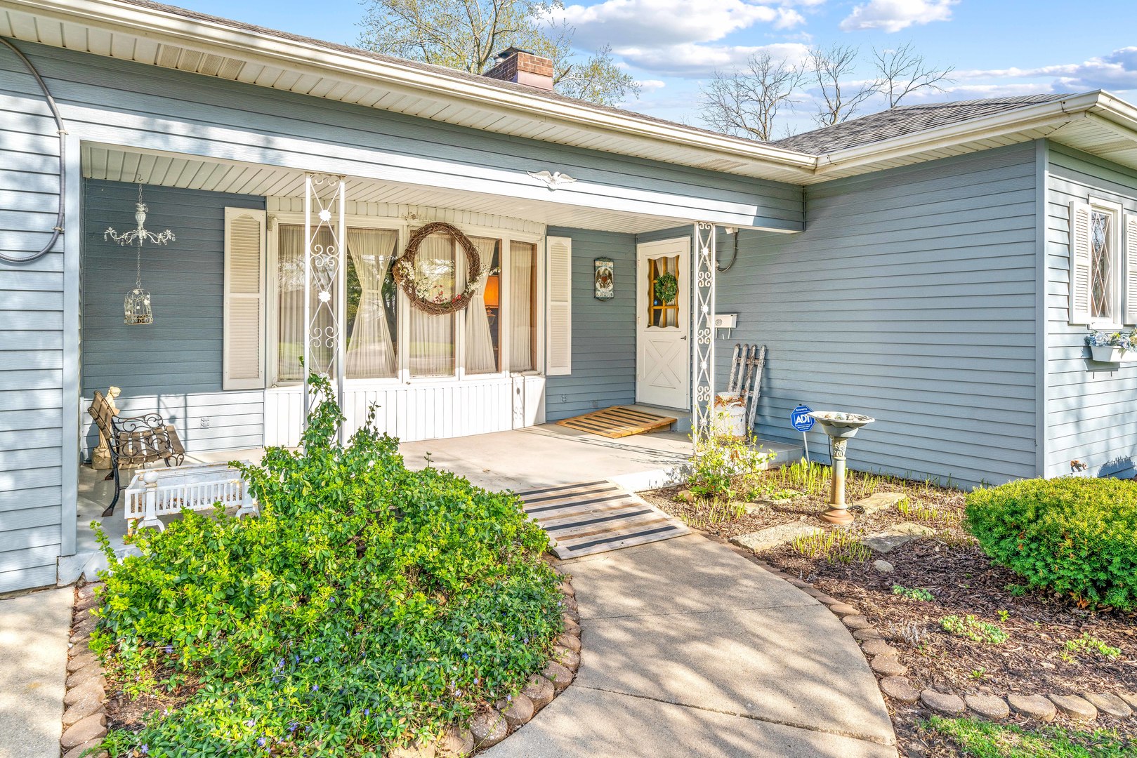 808 Normal Road DeKalb, IL 60115 - Photo 5 of 29 a front view of a house with garden