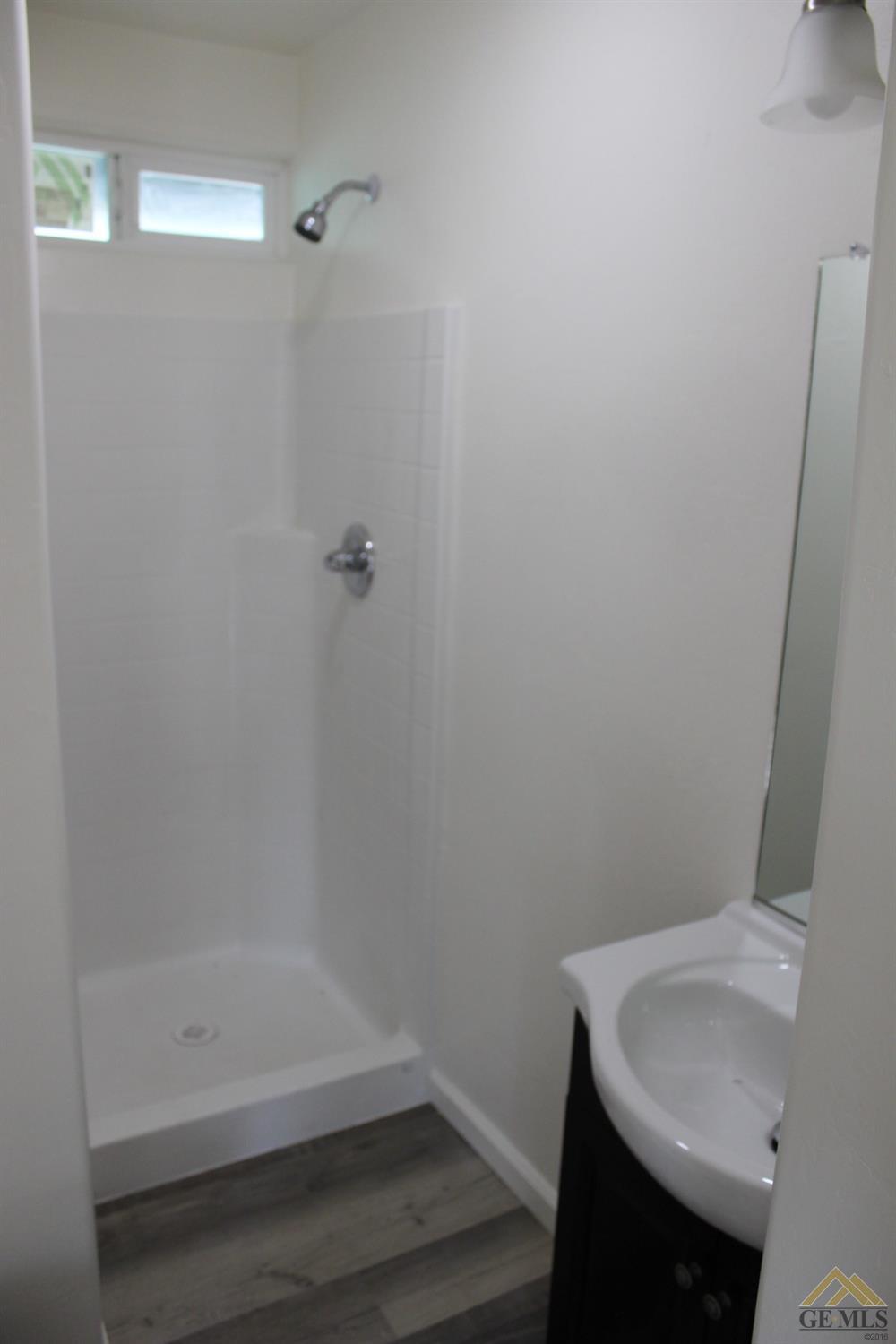 Undisclosed Address Wasco, CA 93280 - Photo 10 of 26 a bathroom with a sink and a toilet