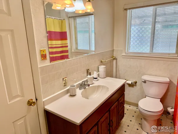 a bathroom with a sink and a toilet