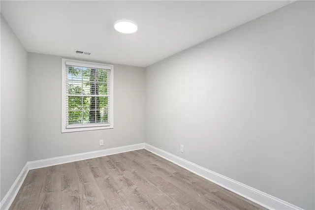 an empty room with a window