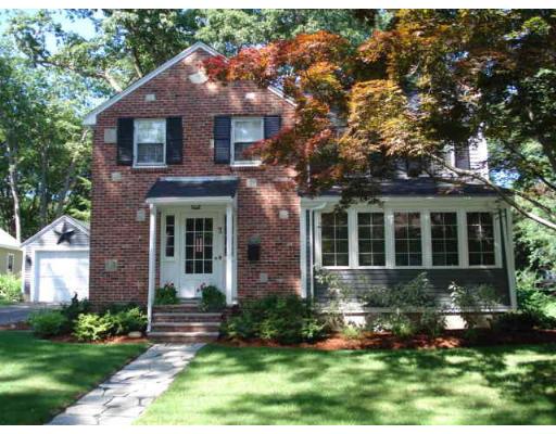 11 Oak Ridge Road Reading, MA 01867 - Photo 1 of 13 front view of house with a yard
