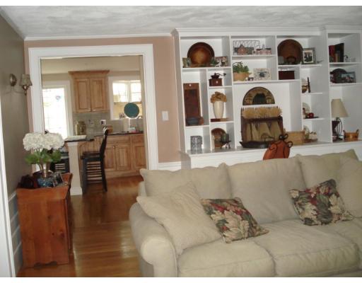 11 Oak Ridge Road Reading, MA 01867 - Photo 3 of 13 a living room with fireplace furniture and decor