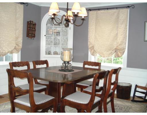 11 Oak Ridge Road Reading, MA 01867 - Photo 4 of 13 a view of a dining room with furniture window and outside view