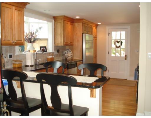 11 Oak Ridge Road Reading, MA 01867 - Photo 5 of 13 a dining room with furniture and large windows