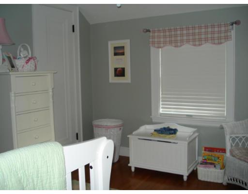 11 Oak Ridge Road Reading, MA 01867 - Photo 10 of 13 a bedroom with a bed and a window