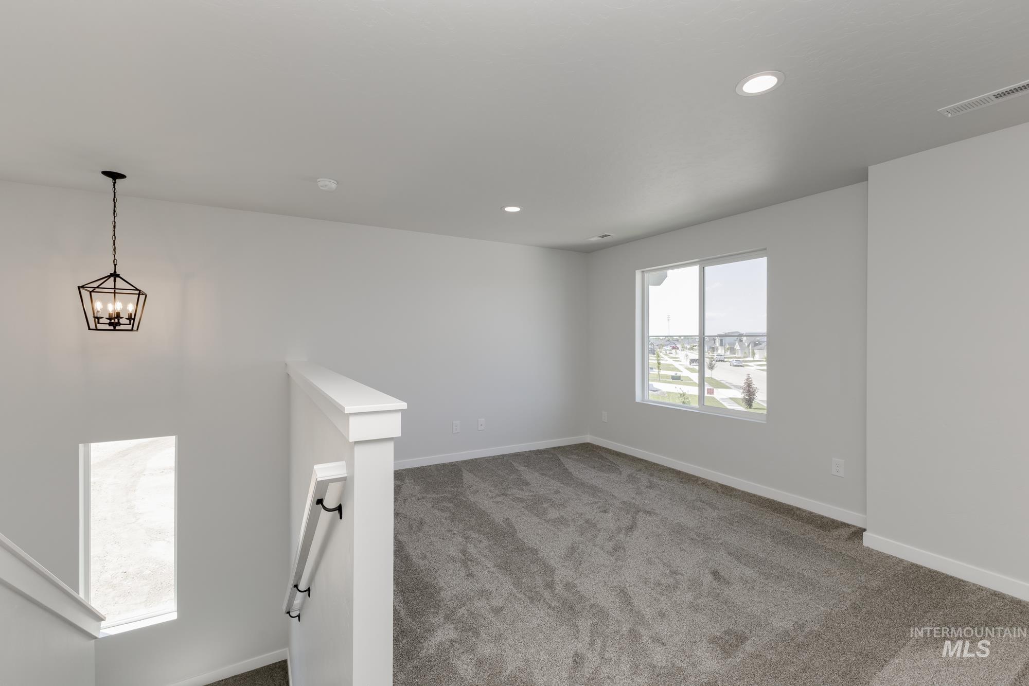 3218 North Waterbrook Way Star, ID 83669 - Photo 14 of 27 Carpeted spare room with recessed lighting