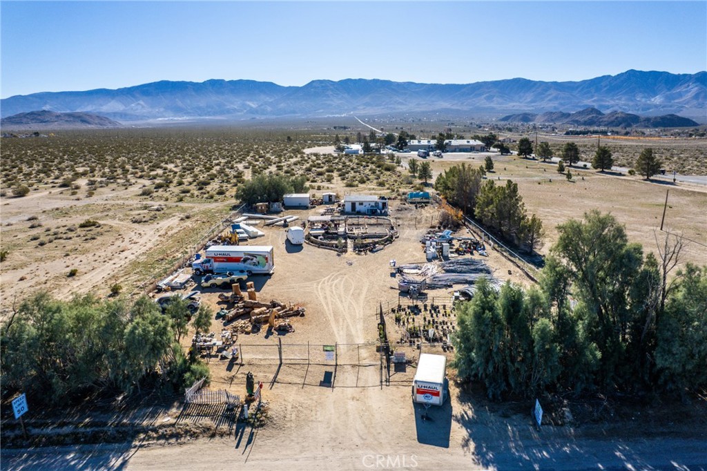 32961 Old Woman Springs Road Lucerne Valley, CA 92356 - Photo 2 of 13 a view of a house with a yard and sitting area