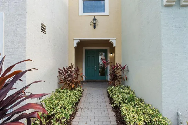 a view of entryway with flower pots