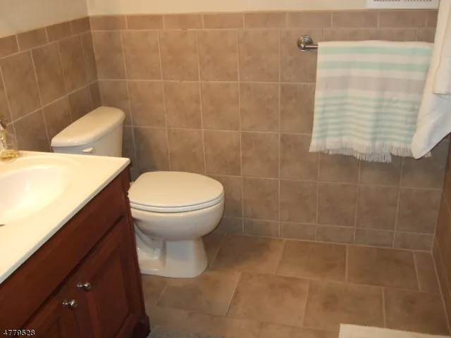 a bathroom with a sink and a toilet