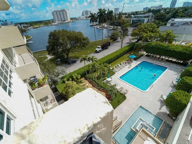 a view of a park with palm trees