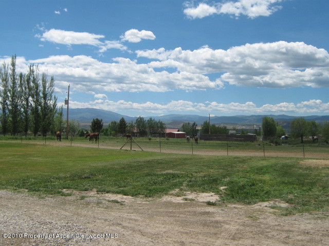 2920 County Road 233 Rifle, CO 81650 - Photo 6 of 13 a view of a golf course with a yard