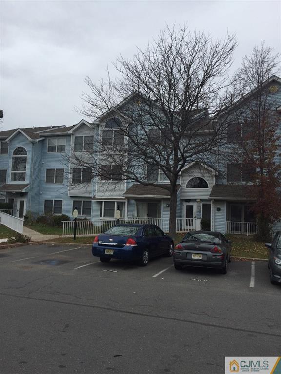 216 Edpas Road New Brunswick, NJ 08901 - Photo 2 of 18 a car parked in front of a building