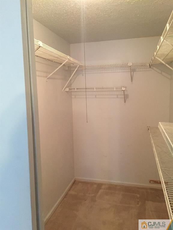 216 Edpas Road New Brunswick, NJ 08901 - Photo 6 of 18 a view of a room with racks on the wall