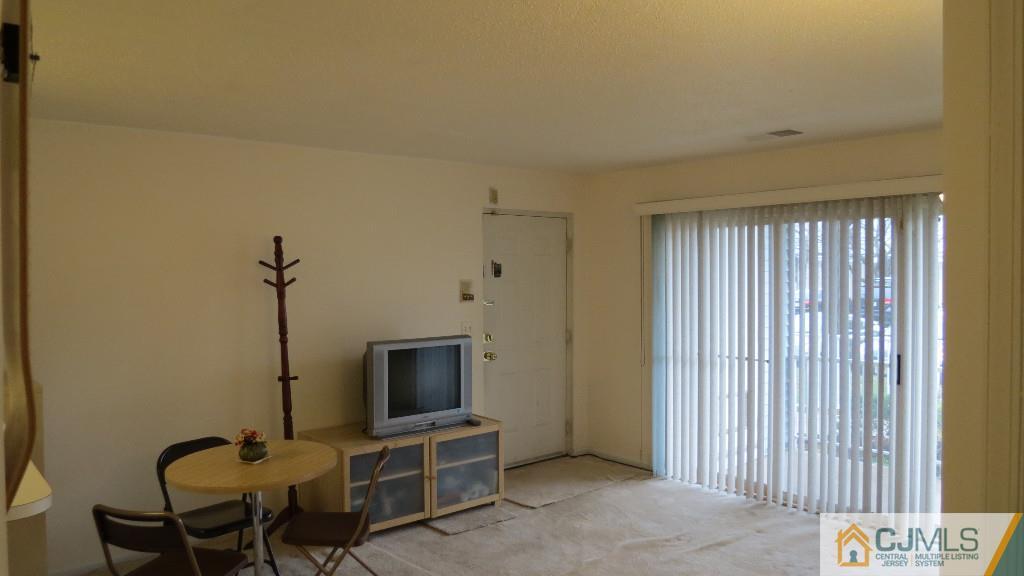 216 Edpas Road New Brunswick, NJ 08901 - Photo 8 of 18 a view of a livingroom with furniture