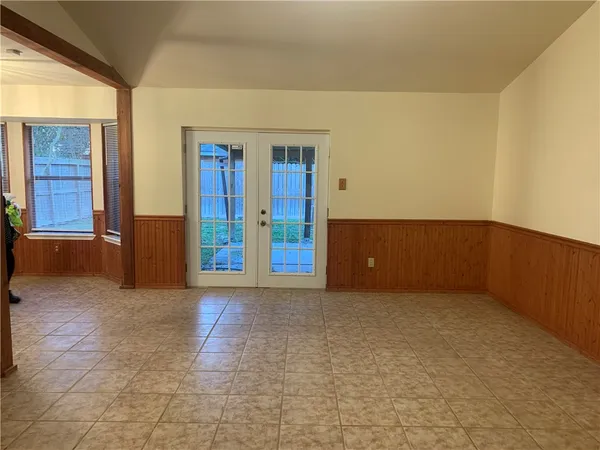 a view of an empty room with window