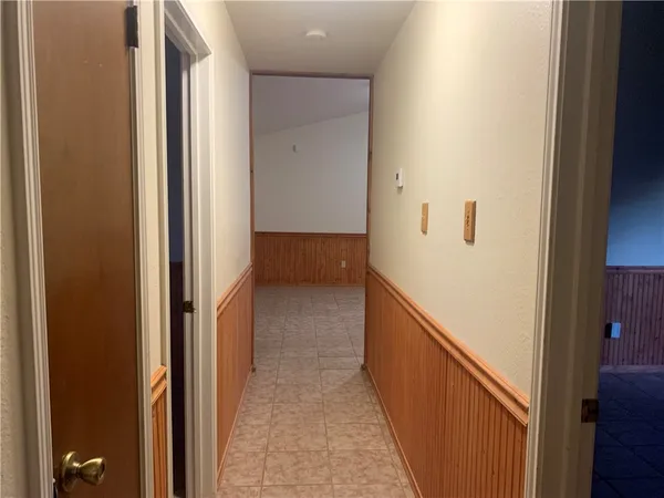 a view of hallway with stairs