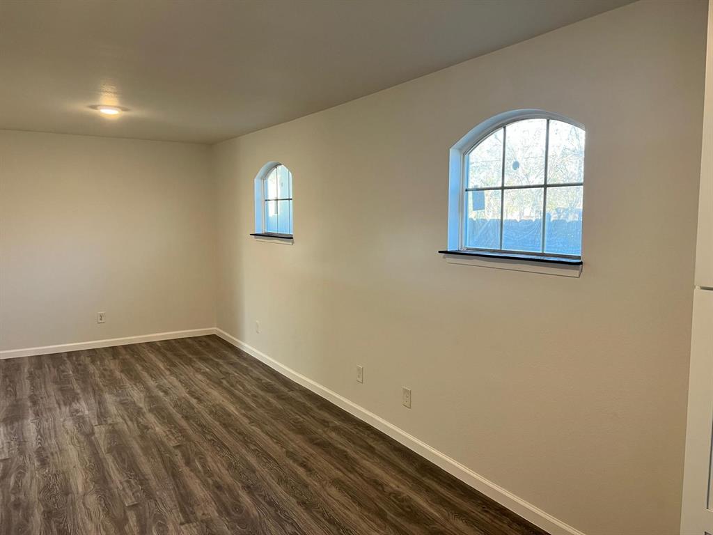 6707 Elam Road Dallas, TX 75217 - Photo 14 of 18 an empty room with a window