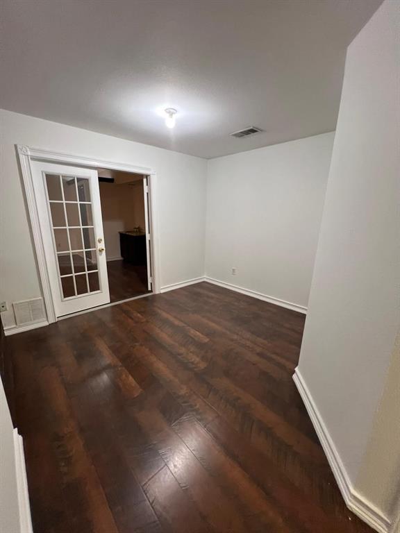 6707 Elam Road Dallas, TX 75217 - Photo 9 of 18 an empty room with windows