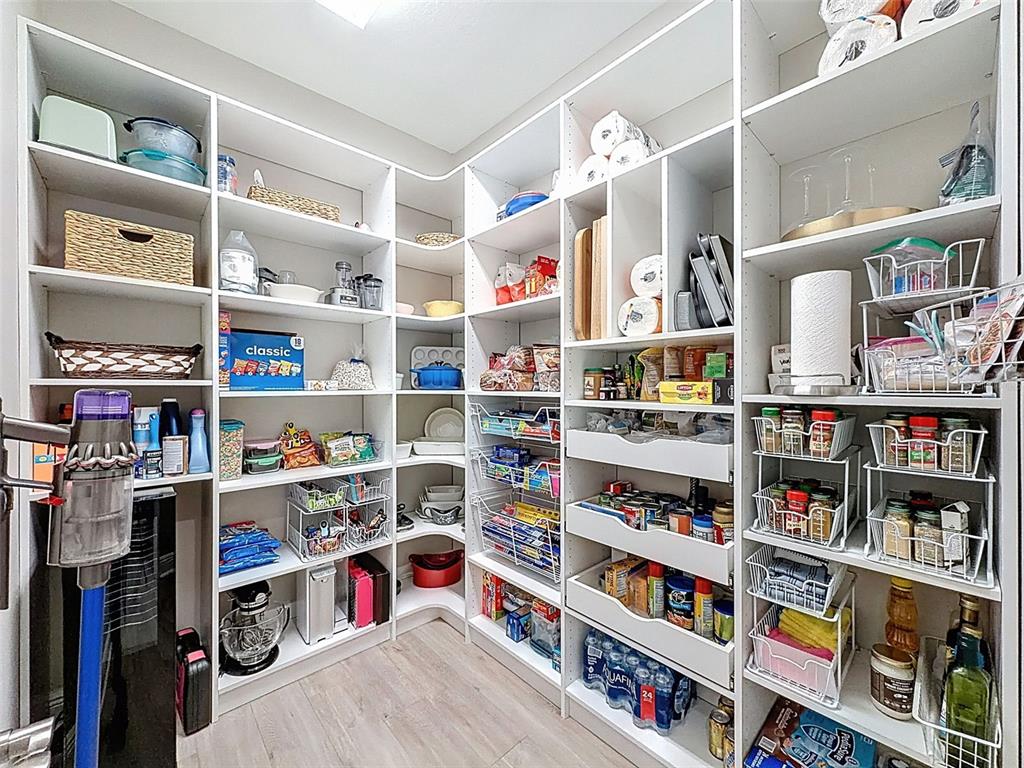 4312 Burdick Loop Odessa, FL 33556 - Photo 16 of 55 a room with a book shelf and a book shelf