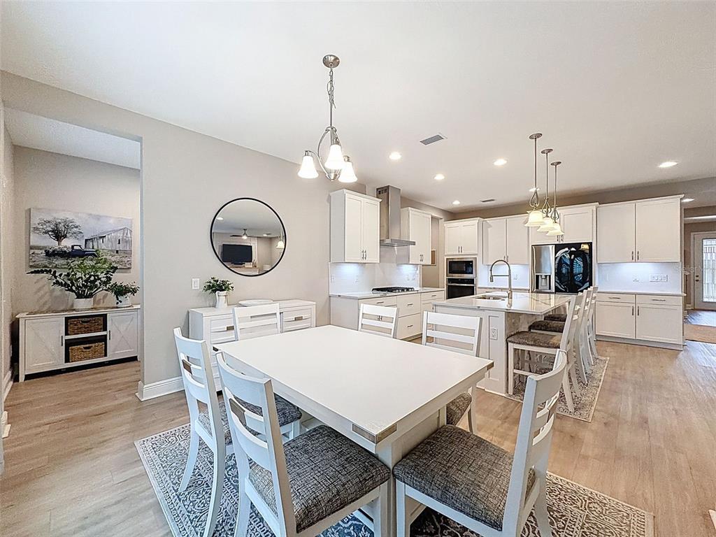 4312 Burdick Loop Odessa, FL 33556 - Photo 18 of 55 a view of a dining room with furniture