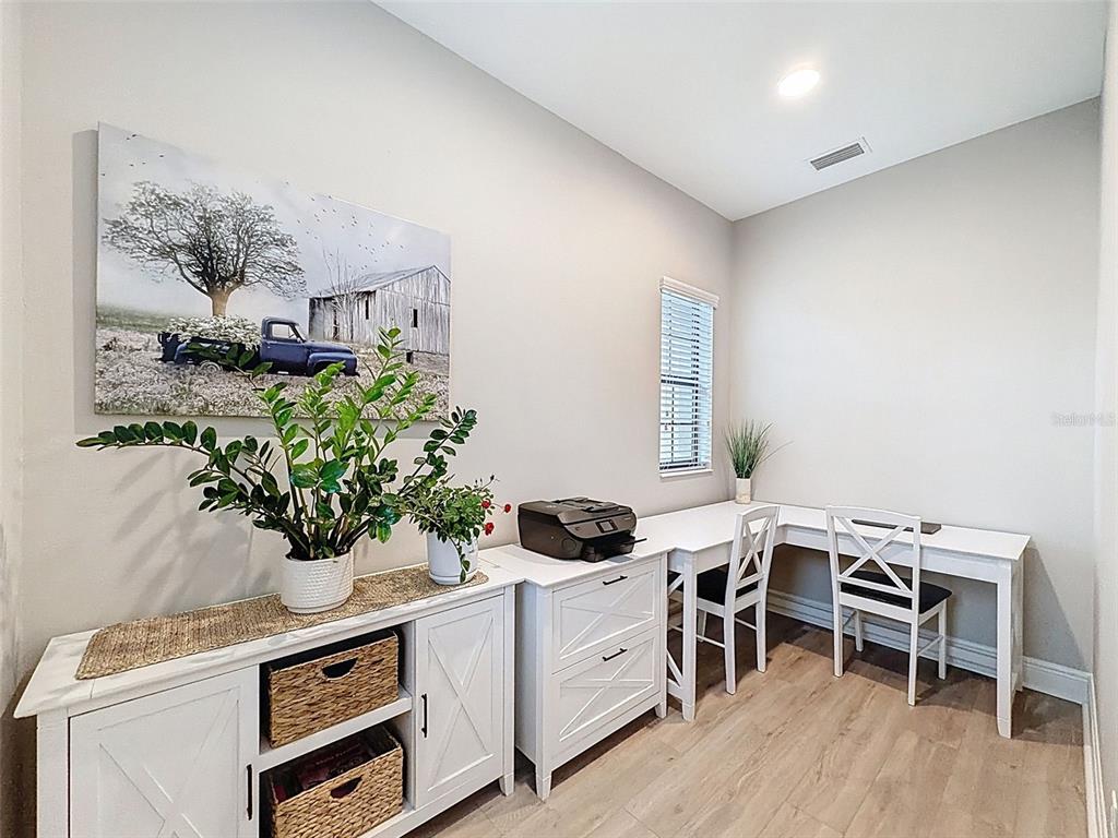 4312 Burdick Loop Odessa, FL 33556 - Photo 19 of 55 a view of a workspace with furniture