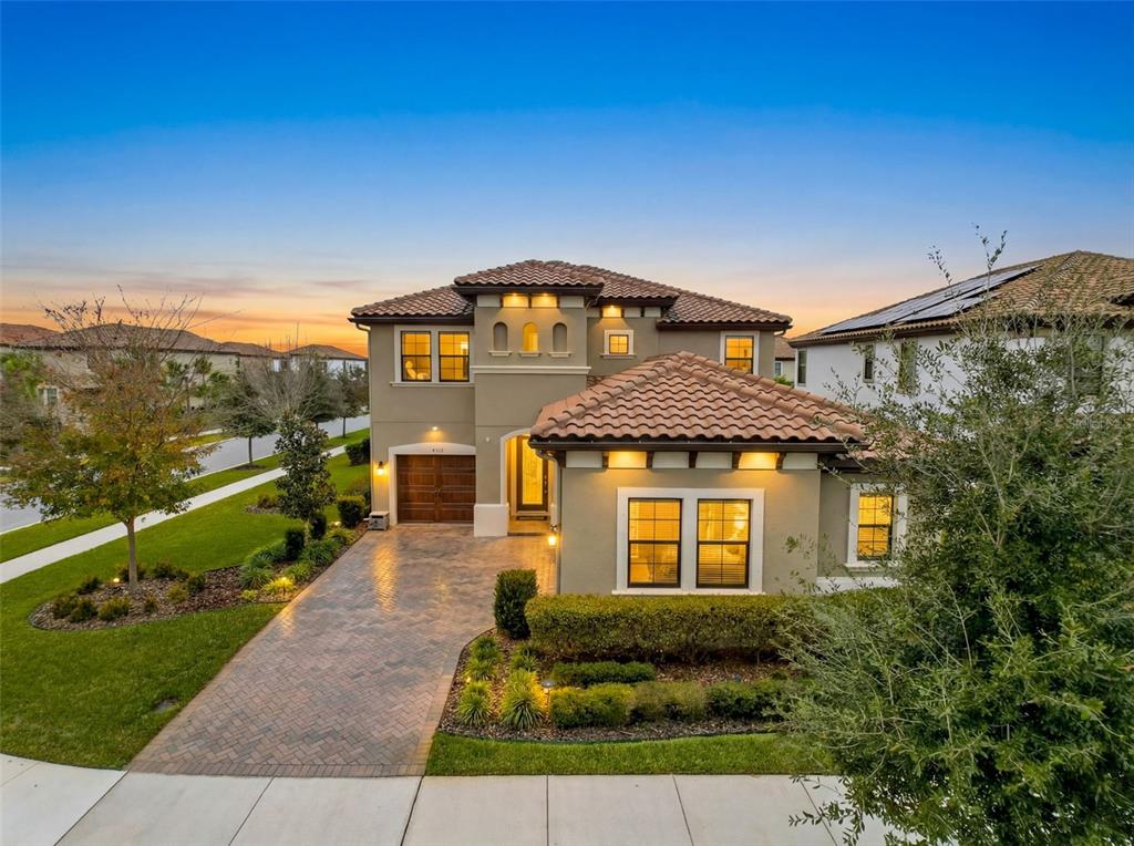 4312 Burdick Loop Odessa, FL 33556 - Photo 2 of 55 a front view of a house with a yard